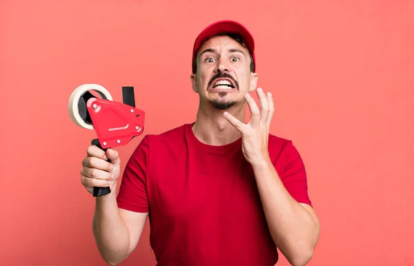 Adult Man Looking Desperate Frustrated Stressed Deliveryman Packer Concept — Stockfoto