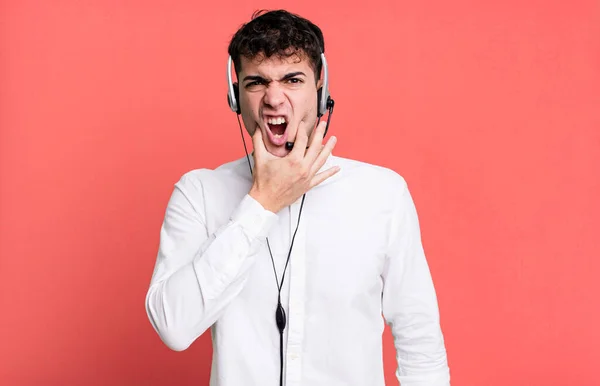 Adult Man Mouth Eyes Wide Open Hand Chin Headset Telemarketer — Stock Photo, Image