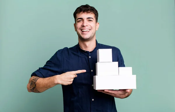 Adult Man Looking Excited Surprised Pointing Side Blank Products Packages — Stock Photo, Image
