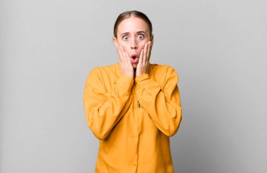 caucasian pretty woman feeling shocked and scared. guilt concept