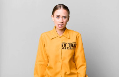 caucasian pretty woman feeling puzzled and confused. guilt concept