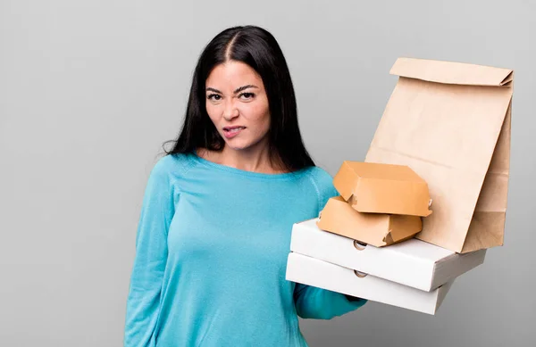 Hispanic Pretty Woman Looking Puzzled Confused Take Away Fast Food — Stock fotografie