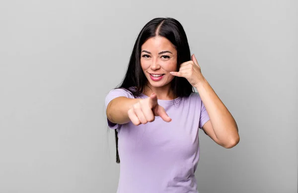 Pretty Latin Woman Smiling Cheerfully Pointing Camera While Making Call — Foto Stock