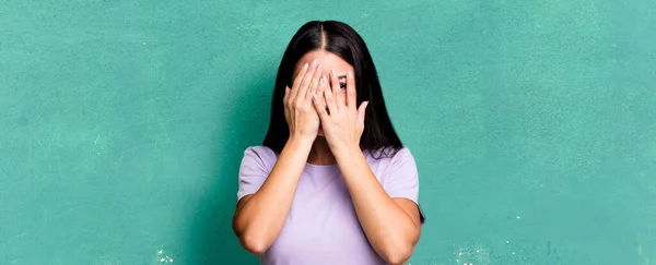 Pretty Latin Woman Covering Face Hands Peeking Fingers Surprised Expression — Stock Photo, Image