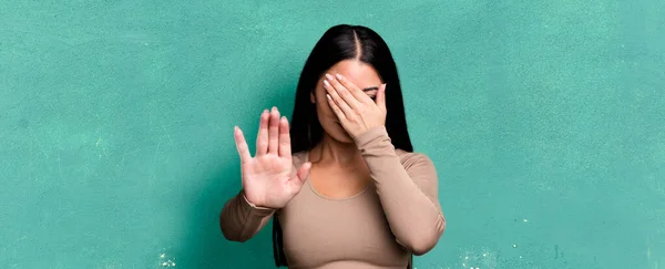 Pretty Latin Woman Covering Face Hand Putting Other Hand Front — Stock Photo, Image