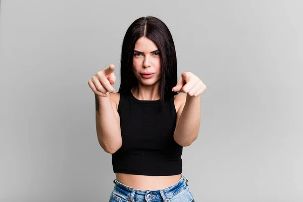 Young Adult Pretty Woman Pointing Forward Camera Both Fingers Angry — Stockfoto