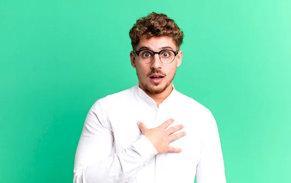 Young Adult Caucasian Man Feeling Shocked Astonished Surprised Hand Chest — Stock Photo, Image