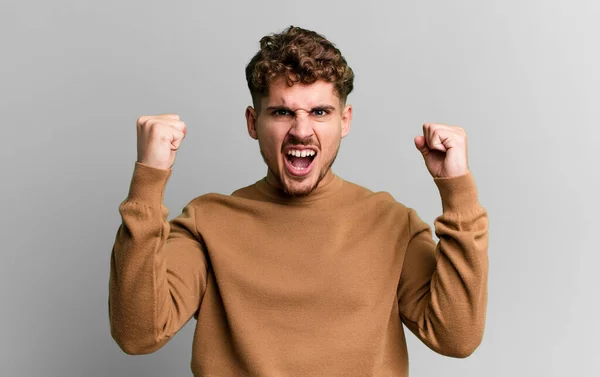 Young Adult Caucasian Man Shouting Aggressively Angry Expression Fists Clenched — Stok fotoğraf