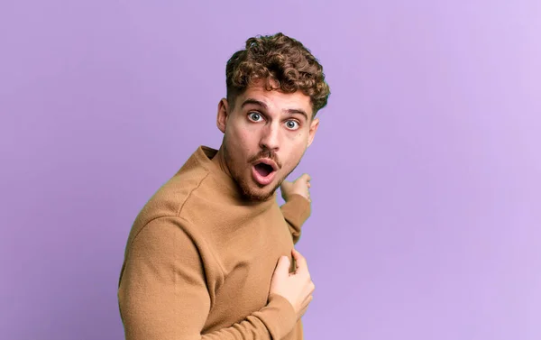 Young Adult Caucasian Man Feeling Shocked Surprised Pointing Copy Space — Fotografia de Stock