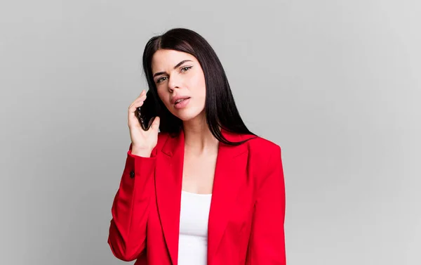 stock image young pretty businesswoman using her smartphone