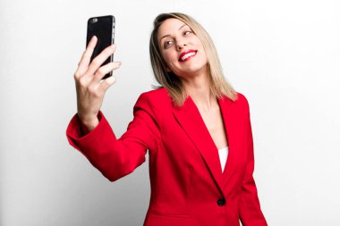 young pretty businesswoman using her smart phone