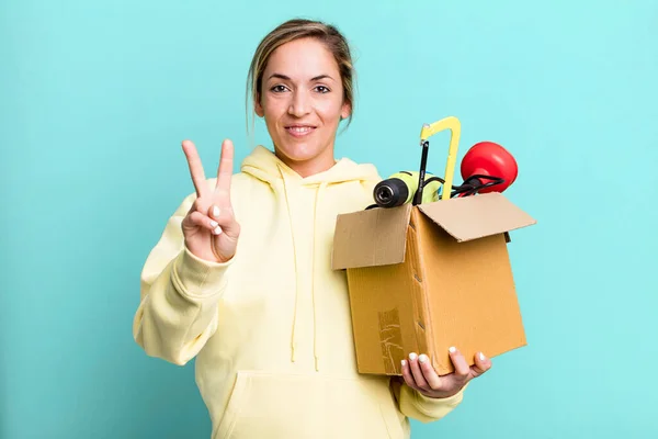 Pretty Blonde Woman Smiling Looking Happy Gesturing Victory Peace Tool — Stockfoto