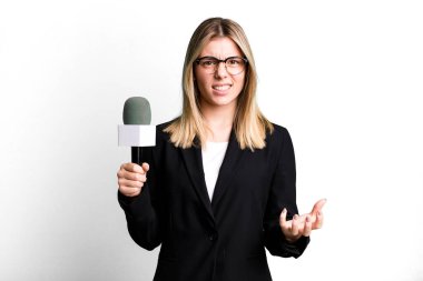 young pretty woman looking angry, annoyed and frustrated. presenter or journalist concept