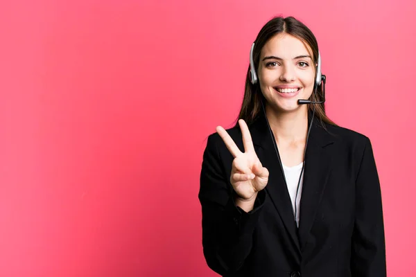 Young Pretty Woman Smiling Looking Happy Gesturing Victory Peace Telemarketing — Stock Photo, Image