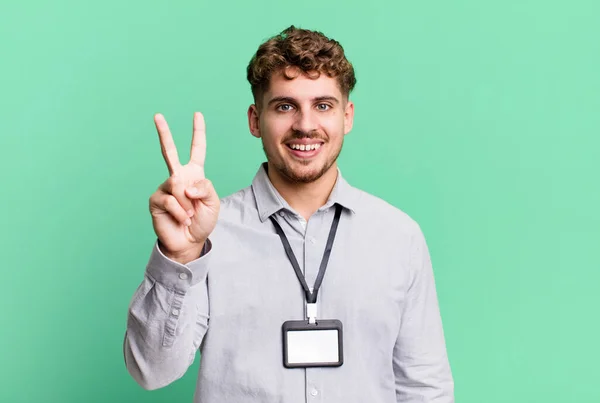 Young Adult Caucasian Man Smiling Looking Friendly Showing Number Two — Photo