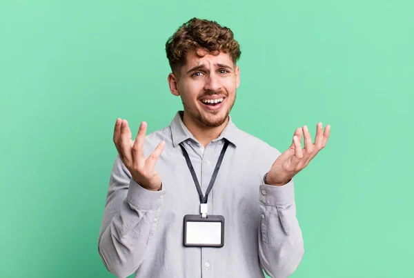 Young Adult Caucasian Man Looking Desperate Frustrated Stressed Blank Accreditation — Stockfoto