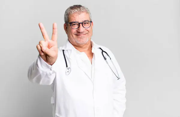 Middle Age Senior Man Smiling Looking Friendly Showing Number Two — Stock Photo, Image