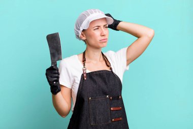 feeling puzzled and confused, scratching head. butcher concept