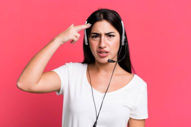 feeling confused and puzzled, showing you are insane. telemarketer concept