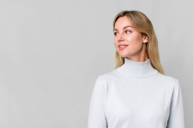 pretty caucasian woman with a copy space to the side