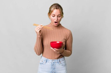 pretty caucasian woman having a diet flakes breakfast bowl