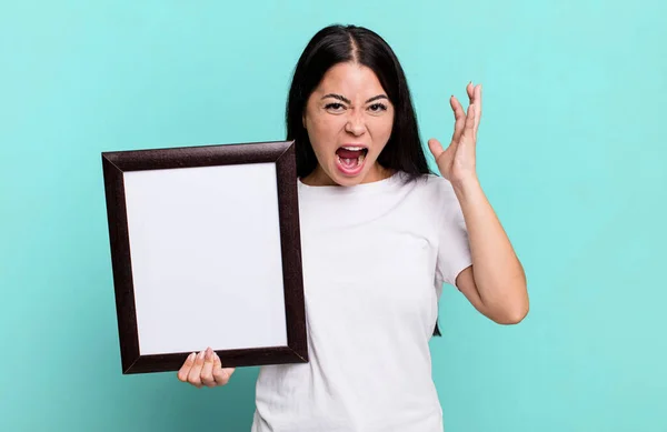 Hispanic Pretty Woman Screaming Hands Air Empty Blank Frame — Stockfoto