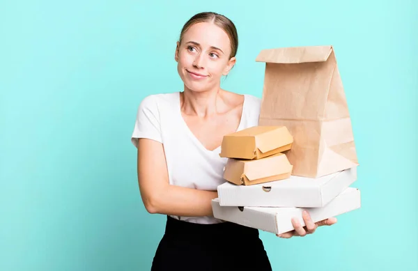 Caucasian Pretty Woman Shrugging Feeling Confused Uncertain Fast Food Packages — 图库照片