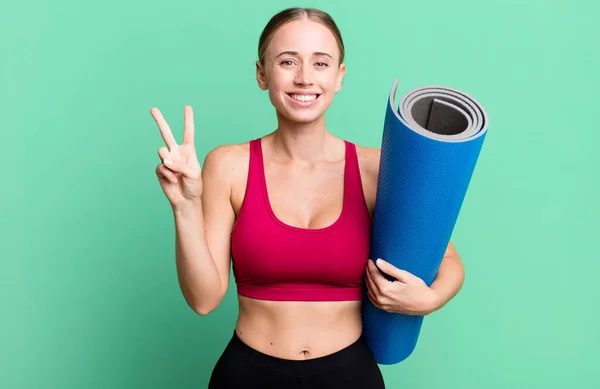 Caucasian Pretty Woman Smiling Looking Friendly Showing Number Two Fitness — Stockfoto