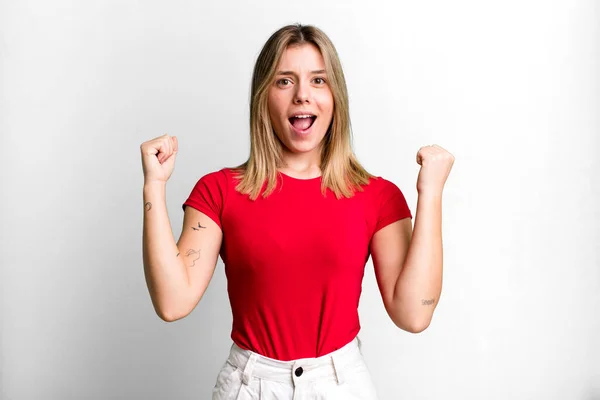 Blonde Pretty Woman Shouting Aggressively Angry Expression Fists Clenched Celebrating — Stock Photo, Image