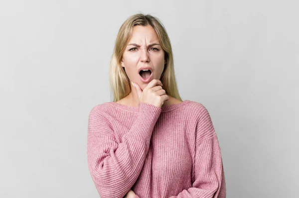 Caucasian Blonde Woman Mouth Eyes Wide Open Hand Chin — Stock Photo, Image