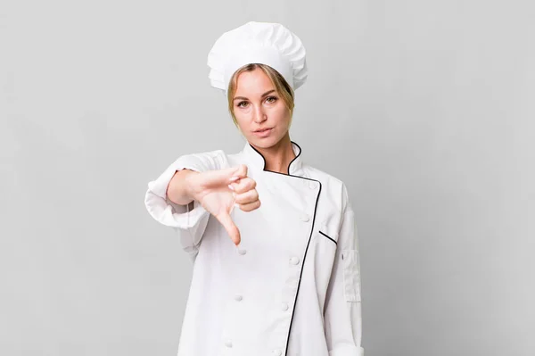 Caucasian Blonde Woman Feeling Cross Showing Thumbs Chef Concept — Zdjęcie stockowe