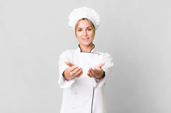 Caucasian Blonde Woman Smiling Happily Friendly Offering Showing Concept Chef — Zdjęcie stockowe