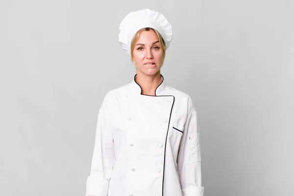 Caucasian Blonde Woman Looking Puzzled Confused Chef Concept — Zdjęcie stockowe
