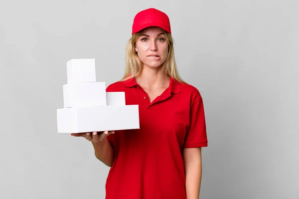Caucasian Blonde Woman Looking Puzzled Confused Delivery Boxes — Stockfoto