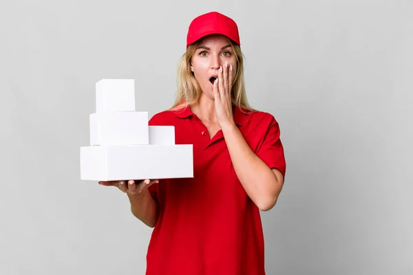 Caucasian Blonde Woman Feeling Shocked Scared Delivery Boxes — Stok fotoğraf