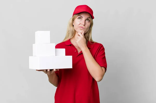 Caucasian Blonde Woman Thinking Feeling Doubtful Confused Delivery Boxes — Stok fotoğraf