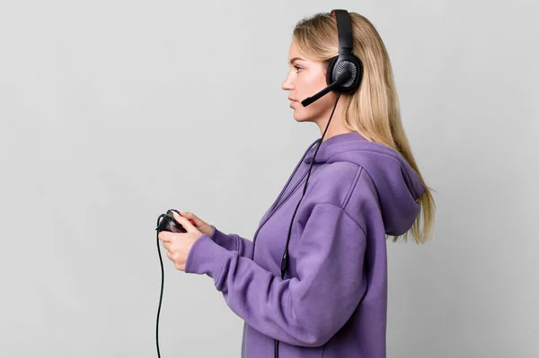 Caucasian Blonde Woman Profile View Thinking Imagining Daydreaming Gamer Concept - Stock-foto