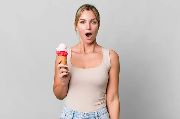 Caucasian Blonde Woman Looking Very Shocked Surprised Ice Cream Concept — Stockfoto