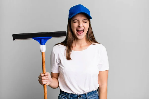 Young Pretty Woman Shouting Aggressively Looking Very Angry Cleaning Windows — Stockfoto