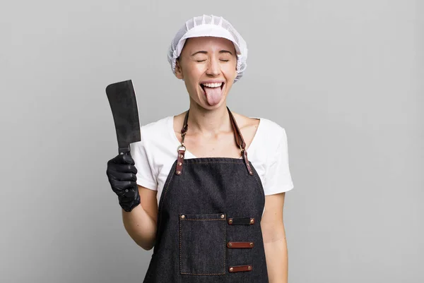 Cheerful Rebellious Attitude Joking Sticking Tongue Out Butcher Concept — стоковое фото