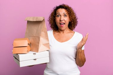 feeling happy and astonished at something unbelievable. take away fast food delivery concept.