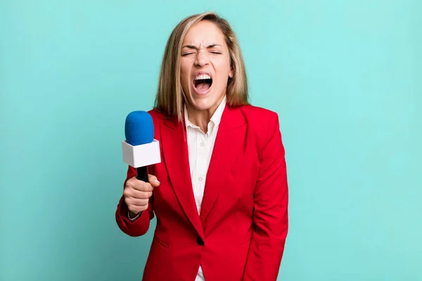 Pretty Blonde Woman Shouting Aggressively Looking Very Angry Presenter Microphone —  Fotos de Stock