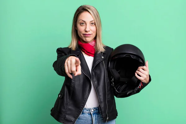 Pretty Blonde Woman Pointing Camera Choosing You Motorbike Rider Helmet — Zdjęcie stockowe