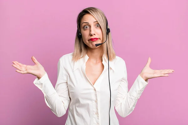 Pretty Blonde Woman Feeling Puzzled Confused Doubting Telemarketer Concept — Foto de Stock