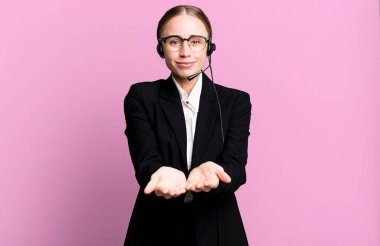 caucasian pretty woman smiling happily with friendly and  offering and showing a concept. telemarketing concept