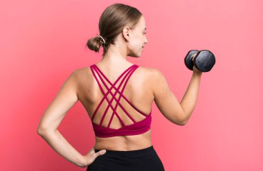 blonde pretty young caucasian woman fitness concept