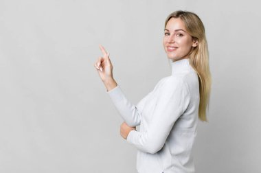 pretty caucasian woman with a copy space to the side