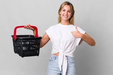 pretty caucasian woman with an empty shopping basket