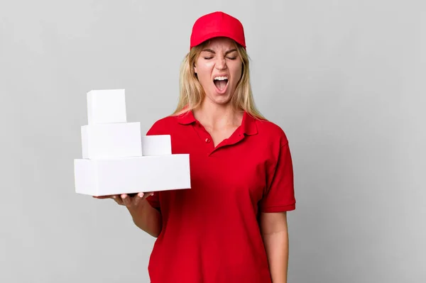 Caucasian Blonde Woman Shouting Aggressively Looking Very Angry Delivery Boxes — Stock Photo, Image