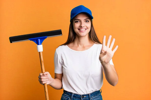 Young Pretty Woman Smiling Looking Friendly Showing Number Four Cleaning — Fotografia de Stock